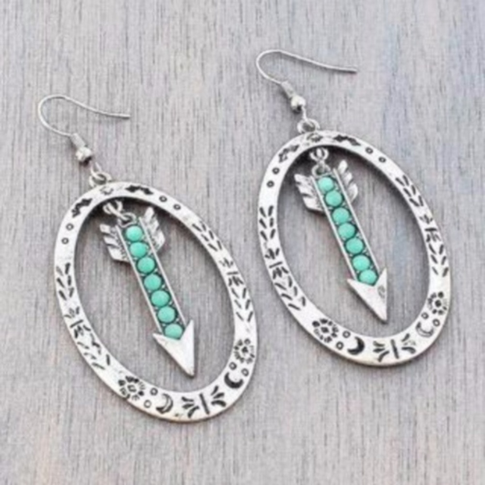 Silvertone Oval Arrow Dangling Earrings